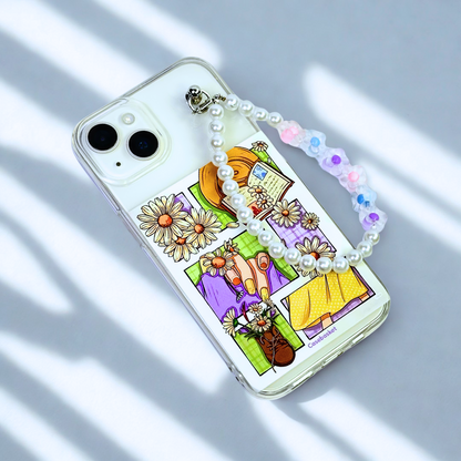 Phone case with colorful design and pearl chain on a light background