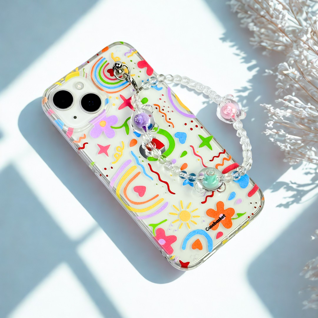 Colorful phone case with decorative elements on a light background