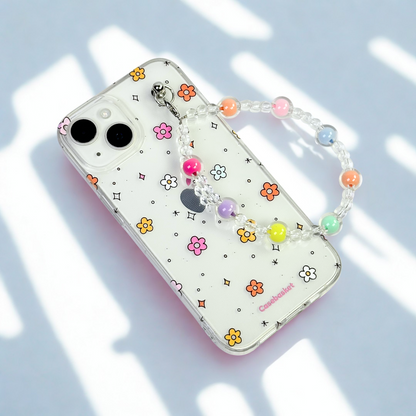 Phone case with colorful floral design and beaded chain on a light background