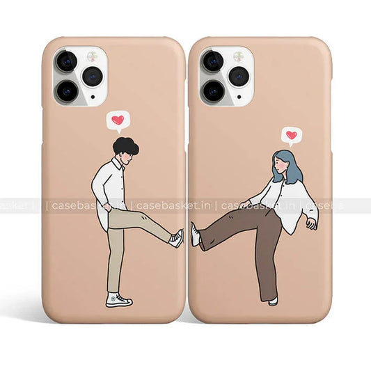 Matching couple cartoon phone cases with heart design and beige background